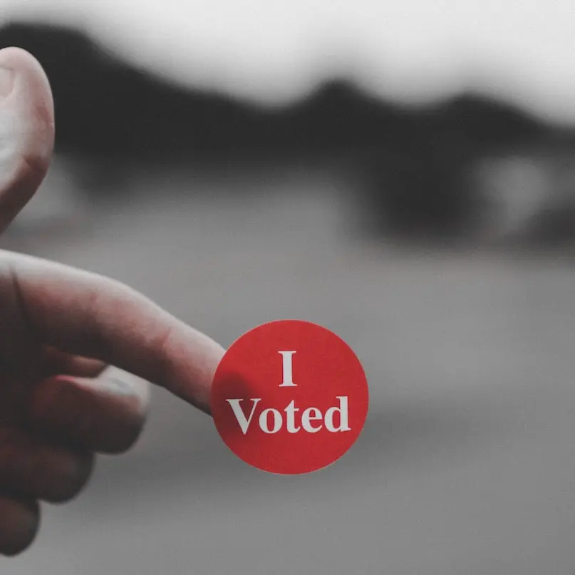 Hand Holding "I Voted" Sticker